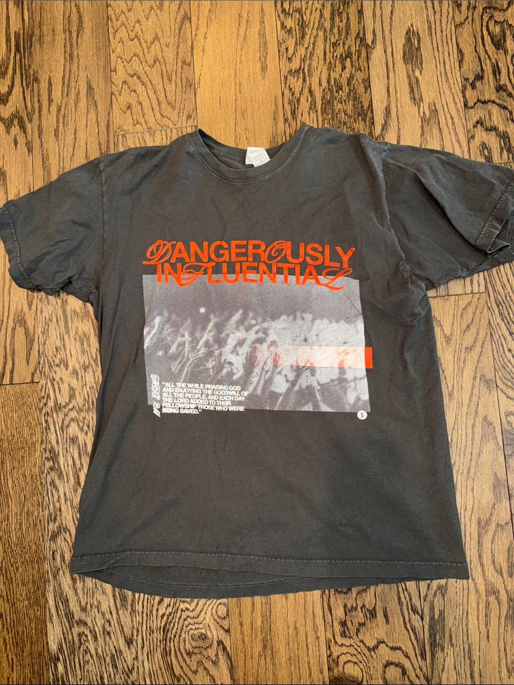 Graphic Tee - Black and Orange Print. “dangerously influential” ~